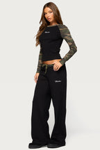 Taye Camo Raglan Long Sleeve Top